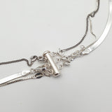 LAYER CLASP