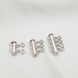 LAYER CLASP