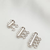 LAYER CLASP